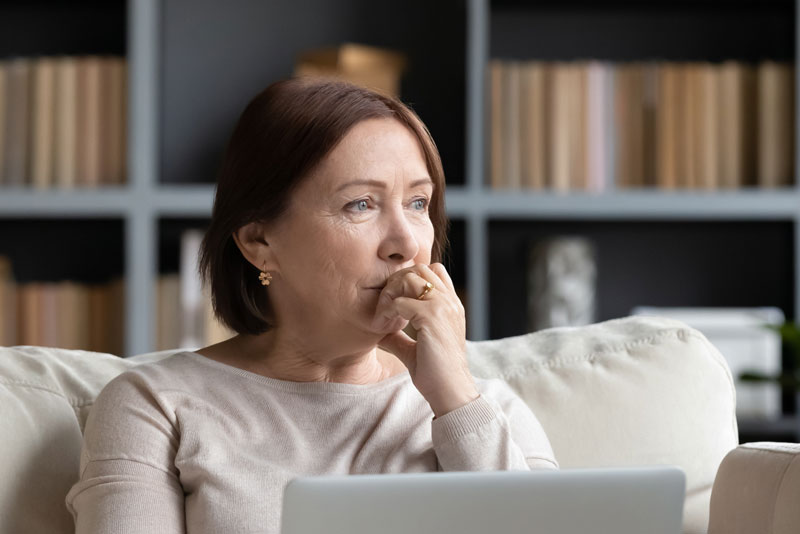 Dental Patient Wondering If She Should Get Dental Implants Or Dentures in [location 1]