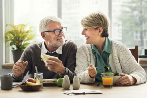 Dental Implant Patients Eating Together In Cedarhurst, NY