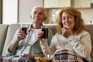 Dental Patients Eating And Drinking Using Their Full Arch Dental Implants